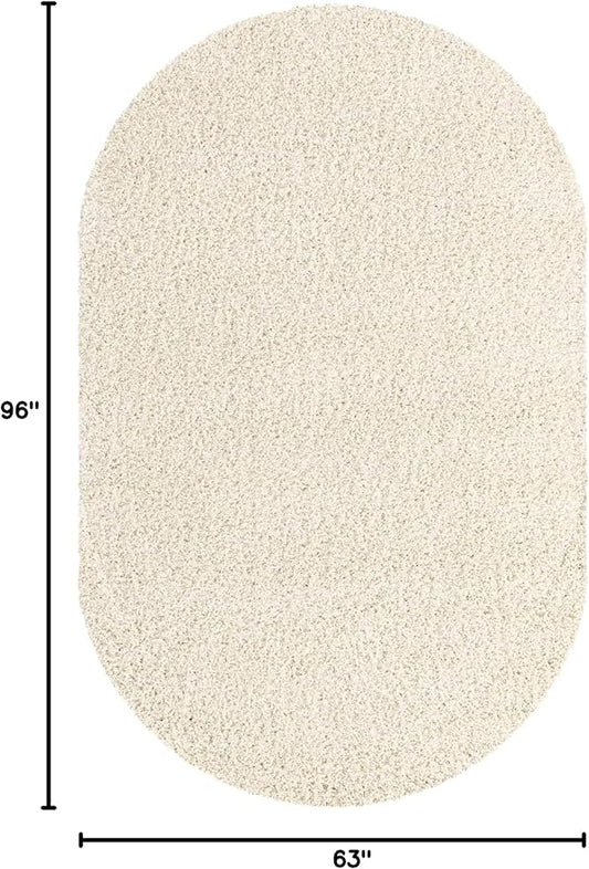 Unique Loom Solid Shag Collection Area Rug (5' 3" x 8' Oval, Snow White)