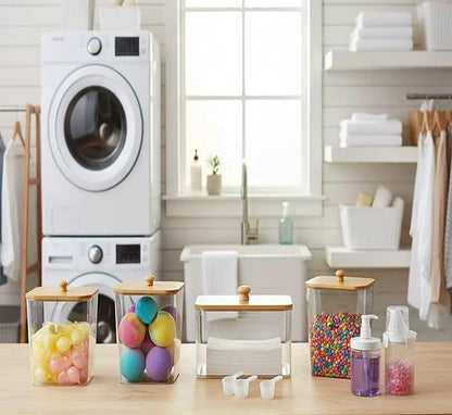 6-Piece Laundry Pod Storage Set. Transparent laundry storage container with bamboo lid and label, ideal for storing fabric softener, liquid detergent, laundry pods, and fragrance boosters.