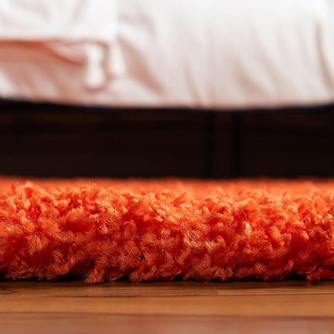 Unique Loom Solid Shag Collection Area Rug (5' 1" x 8' Oval, Tiger Orange)