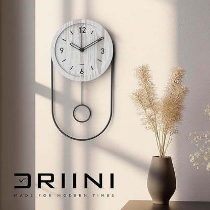 Driini Decorative Wall Clock with Pendulum (White) – Modern Wood, 3D Black Numbers, Metal Frame – Small, Unique Wall Clocks for Living Room Decor or Bathroom - Battery Operated, Silent, Non-Ticking