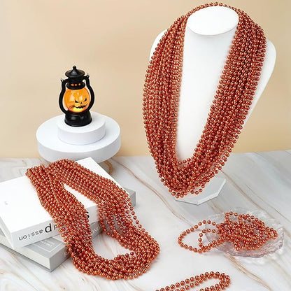 YAXINRUI 24 PCS Orange Bead Necklace, Orange Mardi Gras Beads, 33 Inch Halloween Beaded Necklace for Mardi Gras Christmas Halloween Festive
