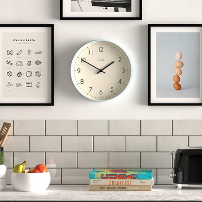 JONES CLOCKS® Studio Wall Clock | Modern Round Style | 12 inch | Pale Blue | Easy to Read Numbers | Versatile Design for Kitchen, Living Room or Office