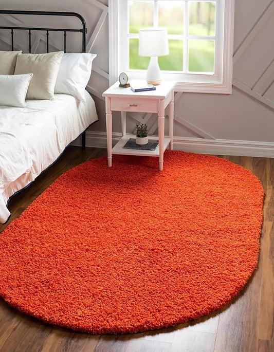 Unique Loom Solid Shag Collection Area Rug (5' 1" x 8' Oval, Tiger Orange)