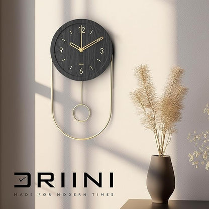 Driini Decorative Wall Clock with Pendulum (Black) – Modern Wood, 3D Gold Numbers, Metal Frame – Small, Unique Wall Clocks for Living Room Decor or Bathroom - Battery Operated, Silent, Non-Ticking
